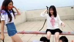 Two Japanese Sluts Enjoy Humiliating Their Slaves